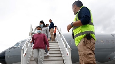 According to information supplied by U.S. and Guatemalan officials, the cost of each migrant aboard U.S. President Donald Trump's military deportation flight to Guatemala on Monday was probably at least $4,675. (AFP)