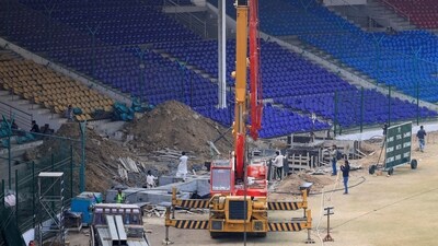 Technicians and labourers work during a media tour, organized by the Pakistan Cricket Board (PCB), to showcase the progress of the renovation work ahead of the ICC Champions Trophy 2025 (REUTERS)