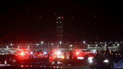 The passenger plane was approaching Runway 33 at the airport when a PSA Airlines Bombardier CRJ700 regional airliner collided with a Sikorsky H-60 helicopter around 9 p.m. ET. In the image: Emergency crews respond to the crash site near the Potomac River. (Bloomberg/Alex Wroblewski) The passenger plane was approaching Runway 33 at the airport when a PSA Airlines Bombardier CRJ700 regional airliner collided with a Sikorsky H-60 helicopter around 9 p.m. ET. In the image: Emergency crews respond to the crash site near the Potomac River. (Bloomberg/Alex Wroblewski)