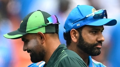 (FILES) India's captain Rohit Sharma (R) and his Pakistani counterpart Babar Azam (AFP) (FILES) India's captain Rohit Sharma (R) and his Pakistani counterpart Babar Azam (AFP)