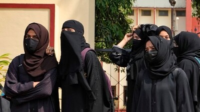 Shiv Sena leader Raju Waghmare reacted to Maharashtra Minister Nitesh Rane's request to ban burqa at examination centres, and said if Burqa is allowed during voting, then there should not be any problem with it during examinations. (Representative image/AP Photo/Aijaz Rahi, File) (AP) Shiv Sena leader Raju Waghmare reacted to Maharashtra Minister Nitesh Rane's request to ban burqa at examination centres, and said if Burqa is allowed during voting, then there should not be any problem with it during examinations. (Representative image/AP Photo/Aijaz Rahi, File) (AP)