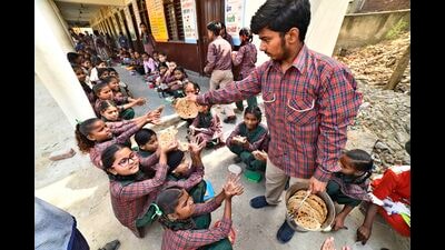 Ludhiana, India - July 22, 2023 : Students eating midday meal in school hours at Government School in Ludhiana. (Photo by Gurpreet Singh/Hindustan Times) (Hindustan Times) Ludhiana, India - July 22, 2023 : Students eating midday meal in school hours at Government School in Ludhiana. (Photo by Gurpreet Singh/Hindustan Times) (Hindustan Times)