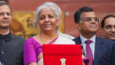 Union Finance Minister Nirmala Sitharaman displays a red pouch carrying the Budget documents outside the Finance Ministry in North Block before leaving for the Parliament where she will table the Union Budget 2024-25, in New Delhi, (File image) (PTI) Union Finance Minister Nirmala Sitharaman displays a red pouch carrying the Budget documents outside the Finance Ministry in North Block before leaving for the Parliament where she will table the Union Budget 2024-25, in New Delhi, (File image) (PTI)