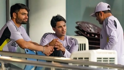 India's Abhishek Sharma, center, is seen with Rinku Singh, left, after the former hurt his ankle during a practice session ahead of the second T20I cricket match between India and England (PTI) India's Abhishek Sharma, center, is seen with Rinku Singh, left, after the former hurt his ankle during a practice session ahead of the second T20I cricket match between India and England (PTI)