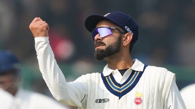 Virat Kohli on the first day of a Ranji trophy cricket match between Delhi and Railways, at the Arun Jaitley Stadium, in New Delhi (PTI) Virat Kohli on the first day of a Ranji trophy cricket match between Delhi and Railways, at the Arun Jaitley Stadium, in New Delhi (PTI)