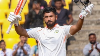 Vidarbha's Karun Nair celebrates a century. (PTI) Vidarbha's Karun Nair celebrates a century. (PTI)