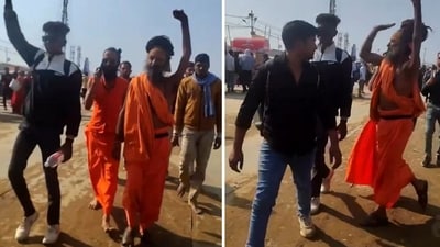 A sadhu slapping a man for copying his gesture. (Screengrab) A sadhu slapping a man for copying his gesture. (Screengrab)