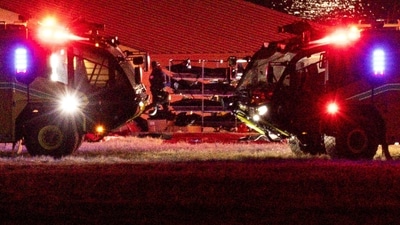 Bodies are transported next to emergency vehicles, near the site of the crash after American Eagle flight 5342 collided with a Black Hawk helicopter while approaching Reagan Washington National Airport and crashed into the Potomac River, outside Washington, U.S., January 30, 2025. REUTERS/Carlos Barria (REUTERS)
