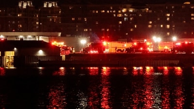 Divers from the state police have been dispatched to the scene of the plane-helicopter crash in the Potomac River, as confirmed by Maryland Governor Wes Moore. The state's Emergency Operations Centre has been placed on "Enhanced" status for additional support. (REUTERS/Carlos Barria)