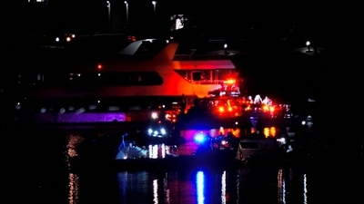 Washington DC plane crash: Debris is seen at the site of the crash, after American Eagle flight 5342 collided with a Black Hawk helicopter while approaching Reagan Washington National Airport and crashed into the Potomac River. (REUTERS)