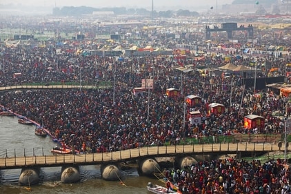 Pilgrims gather to take a holy dip at the Triveni Sangam on the occasion of 'Mauni Amavasya' during the Maha Kumbh Mela festival in Prayagraj. (Niharika Kulkarni/AFP) Pilgrims gather to take a holy dip at the Triveni Sangam on the occasion of 'Mauni Amavasya' during the Maha Kumbh Mela festival in Prayagraj. (Niharika Kulkarni/AFP)