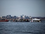 U.S. Coast Guard, along with other search and rescue teams, operate near debris in a location given as Washington, in the aftermath of the collision of American Eagle flight 5342 and a Black Hawk helicopter that crashed into the Potomac River, U.S., in this handout release on January 30, 2025. U.S. Coast Guard/Handout via REUTERS