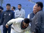 Virat Kohli touches childhood coach Rajkumar Sharma's feet Virat Kohli touches childhood coach Rajkumar Sharma's feet