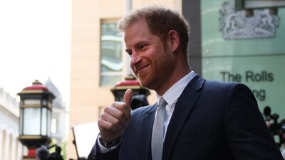 Prince Harry and Meghan Markle feels humiliated and betrayed by the article's claims, prompting Harry to explore his legal options for damages. (Photo by Adrian DENNIS / AFP) (AFP)
