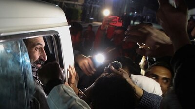 A 110 freed Palestinian prisoners were also welcomed after being released from Israeli jails, returning to Gaza where a ceasefire has brought temporary peace to the region (Hatem Khaled/REUTERS)