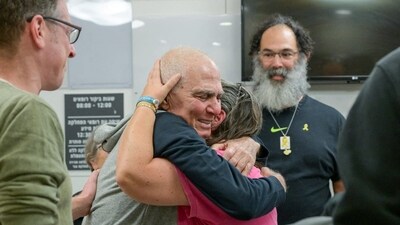 Three Israeli and five Thai hostages have been released from Gaza, in exchange for hundreds of Palestinian prisoners and detainees, in a hostage-prisoner exchange deal between Israel and Hamas on January 30, 2025. Eighty-year-old Gadi Moses is seen here reuniting with his family after the 15-month-long war between Israel and Hamas. (Maayan Toaf/GPO/Handout via REUTERS)