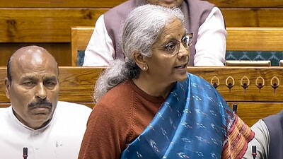 Union Finance Minister Nirmala Sitharaman presents the Economic Survey 2024-25 in the Lok Sabha during the Budget session of Parliament, in New Delhi on Friday. (Sansad TV via PTI) Union Finance Minister Nirmala Sitharaman presents the Economic Survey 2024-25 in the Lok Sabha during the Budget session of Parliament, in New Delhi on Friday. (Sansad TV via PTI)