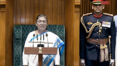 New Delhi, Jan 31 (ANI): President Droupadi Murmu stands for National Anthem before addressing the joint sitting of both Houses of Parliament on the first day of the Budget Session, in New Delhi on Friday. (Sansad Tv) New Delhi, Jan 31 (ANI): President Droupadi Murmu stands for National Anthem before addressing the joint sitting of both Houses of Parliament on the first day of the Budget Session, in New Delhi on Friday. (Sansad Tv)