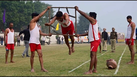 Participants exhibiting their skills the during the Kila Raipur games in Ludhiana on Friday. (Gurpreet Singh/HT)