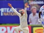 Australia's Nathan Lyon (L) successfully appeals for leg before wicket (LBW) against Sri Lanka's Angelo Mathews during the fourth day of the first Test Australia's Nathan Lyon (L) successfully appeals for leg before wicket (LBW) against Sri Lanka's Angelo Mathews during the fourth day of the first Test
