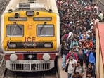 Passengers get off a train at a railway station on the day of Union Budget 2025-26 presentation, in Kolkata, Saturday, Feb. 1, 2025. 