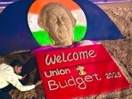Sudarshan Pattnaik said that the art is created by 4 tonnes of sand with the message of Welcome Union Budget 2025 written on it. Sudarshan Pattnaik said that the art is created by 4 tonnes of sand with the message of Welcome Union Budget 2025 written on it.