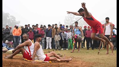 Athletes compete during the Kila Raipur Games in Ludhiana on Saturday. (HT Photo) Athletes compete during the Kila Raipur Games in Ludhiana on Saturday. (HT Photo)