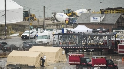 Emergency vehicles have arrived as recovery operations kicked off in the Anacostia River at the Potomac River near Ronald Reagan Washington National Airport, Friday, Jan. 31, 2025, in Washington (AP) Emergency vehicles have arrived as recovery operations kicked off in the Anacostia River at the Potomac River near Ronald Reagan Washington National Airport, Friday, Jan. 31, 2025, in Washington (AP)