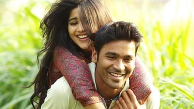 Megha Akash and Dhanush in a still from Enai Noki Paayum Thota. Megha Akash and Dhanush in a still from Enai Noki Paayum Thota.