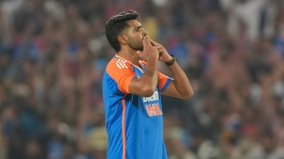 Pune: India's Harshit Rana celebrates the wicket of England batter Jacob Bethell during the fourth T20 cricket match between India and England, at Maharashtra Cricket Association Stadium. (PTI)