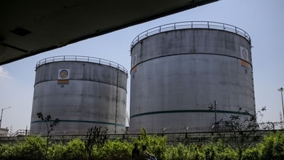Silos at an oil refinery operated by Bharat Petroleum Corp. Ltd., in Mumbai, India, on Tuesday, April 4, 2023. A surprise cut in oil production from OPEC+ is now setting the stage for other producers to vie for markets in Asia. (Dhiraj Singh/Bloomberg)