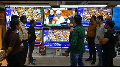 Kolkata, India - Feb. 1, 2025: People watching Union Budget 2025-2026 is presented by Union Finance Minister Nirmala Sitharaman at an Electronic shop in Kolkata, India, on Saturday, February 1, 2025. (Photo by Samir Jana/ Hindustan Times) (Hindustan Times) Kolkata, India - Feb. 1, 2025: People watching Union Budget 2025-2026 is presented by Union Finance Minister Nirmala Sitharaman at an Electronic shop in Kolkata, India, on Saturday, February 1, 2025. (Photo by Samir Jana/ Hindustan Times) (Hindustan Times)