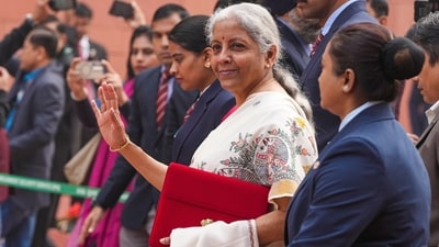 Nirmala Sitharaman arrives at the Parliament House complex to present the Union Budget 2025-26 in New Delhi ahead of her eight budget presentation. (PTI) Nirmala Sitharaman arrives at the Parliament House complex to present the Union Budget 2025-26 in New Delhi ahead of her eight budget presentation. (PTI)