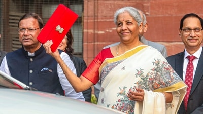 Nirmala Sitharaman with Union Minister of State for Finance Pankaj Chaudhary and other officials outside the Finance Ministry ahead of the presentation of the Union Budget 2025-26. (PTI) Nirmala Sitharaman with Union Minister of State for Finance Pankaj Chaudhary and other officials outside the Finance Ministry ahead of the presentation of the Union Budget 2025-26. (PTI)