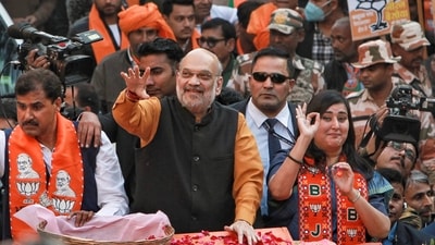 Union home minister and BJP leader Amit Shah with party MP Bansuri Swaraj during a roadshow in support of party candidate Neeraj Basoya ahead of Delhi assembly election in New Delhi on Tuesday. (PTI) Union home minister and BJP leader Amit Shah with party MP Bansuri Swaraj during a roadshow in support of party candidate Neeraj Basoya ahead of Delhi assembly election in New Delhi on Tuesday. (PTI)