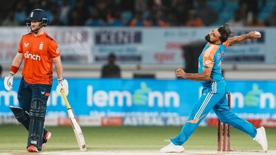 Rajkot: India's Mohammed Shami bowls during the third T20 cricket match between India and England at the Niranjan Shah Stadium in Rajkot. (PTI)