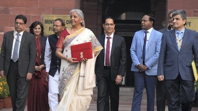 Nirmala Sitharaman has once again made a style statement with her saree choice for the Budget 2025 speech. She wore an elegant cream and gold saree with Madhubani border for historic 8th budget. (PTI) Nirmala Sitharaman has once again made a style statement with her saree choice for the Budget 2025 speech. She wore an elegant cream and gold saree with Madhubani border for historic 8th budget. (PTI)