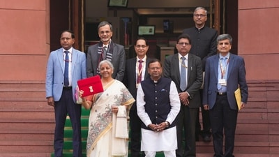 Union finance minister Nirmala Sitharaman with Union Minister of State for Finance Pankaj Chaudhary and other officials. (PTI) Union finance minister Nirmala Sitharaman with Union Minister of State for Finance Pankaj Chaudhary and other officials. (PTI)