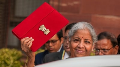 Union Finance Minister Nirmala Sitharaman outside the Finance Ministry ahead of the presentation of Union Budget 2025-26, in New Delhi, Saturday, Feb. 1, 2025. Sitharaman on Saturday will present her eighth consecutive Budget, which she will deliver from a digital tablet enclosed in a traditional 'bahi-khata' style pouch. (Atul Yadav/PTI) Union Finance Minister Nirmala Sitharaman outside the Finance Ministry ahead of the presentation of Union Budget 2025-26, in New Delhi, Saturday, Feb. 1, 2025. Sitharaman on Saturday will present her eighth consecutive Budget, which she will deliver from a digital tablet enclosed in a traditional 'bahi-khata' style pouch. (Atul Yadav/PTI)