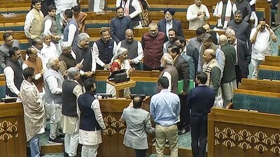 Prime Minister Narendra Modi and union ministers greet finance minister Nirmala Sitharaman after she presented the Union Budget 2025-26 in the Lok Sabha. (PTI)