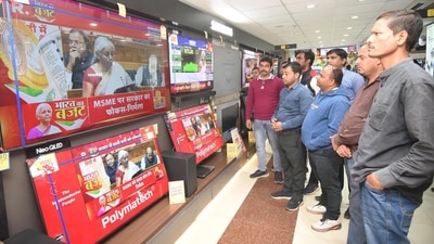 Patna, Bihar, India -Feb .01, 2025: People looking Union Budget 2025-26 on TV screens presented by Union Finance Minister Nirmala Sitharaman at a shop in Patna, Bihar, India, Saturday,01, 2025.(Photo by Santosh Kumar/ Hindustan Times) Patna, Bihar, India -Feb .01, 2025: People looking Union Budget 2025-26 on TV screens presented by Union Finance Minister Nirmala Sitharaman at a shop in Patna, Bihar, India, Saturday,01, 2025.(Photo by Santosh Kumar/ Hindustan Times)
