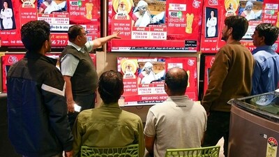 People watching the live telecast of the Union Budget 2025 presented by Finance Minister Nirmala Sitharaman in the Lok Sabha on Saturday. (ANI PHOTO) People watching the live telecast of the Union Budget 2025 presented by Finance Minister Nirmala Sitharaman in the Lok Sabha on Saturday. (ANI PHOTO)