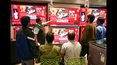 Ranchi, Feb 01 (ANI): People watch the live telecast of Union Budget 2025 presented by Finance Minister Nirmala Sitharaman in the Lok Sabha of the Parliament, at a television showroom in Ranchi on Saturday. (ANI Photo) (Somnath Sen) Ranchi, Feb 01 (ANI): People watch the live telecast of Union Budget 2025 presented by Finance Minister Nirmala Sitharaman in the Lok Sabha of the Parliament, at a television showroom in Ranchi on Saturday. (ANI Photo) (Somnath Sen)