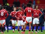 Manchester United's Alejandro Garnacho and teammates look dejected after the match