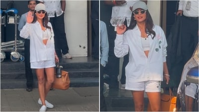 Priyanka Chopra stuns in an all-white look at Mumbai airport. Priyanka Chopra stuns in an all-white look at Mumbai airport.