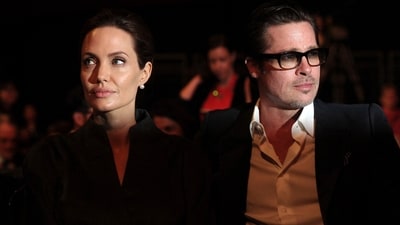 Famed actors Brad Pitt and Angelina Jolie signed off on a divorce settlement on December 30, 2024. (Photo by CARL COURT / AFP) Famed actors Brad Pitt and Angelina Jolie signed off on a divorce settlement on December 30, 2024. (Photo by CARL COURT / AFP)