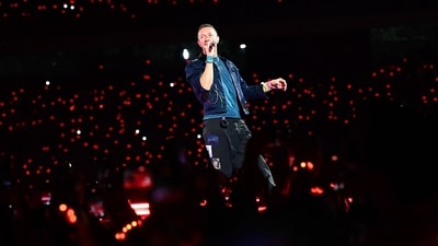 Chris Martin of the British rock band Coldplay performs onstage during a concert as part of their Music of the Spheres World Tour at the DY Patil stadium in Navi Mumbai on January 18, 2025. (AFP) Chris Martin of the British rock band Coldplay performs onstage during a concert as part of their Music of the Spheres World Tour at the DY Patil stadium in Navi Mumbai on January 18, 2025. (AFP)