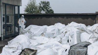 A member of the Congolese Red Cross disinfects body bags in the morgue of Goma General Hospital on February 1, 2025. The Rwandan-backed M23 group was pushing south in mineral-rich eastern DR Congo as the United Nations warned the escalating conflict had killed at least 700 people in less than a week. (Photo by ALEXIS HUGUET / AFP) (AFP) A member of the Congolese Red Cross disinfects body bags in the morgue of Goma General Hospital on February 1, 2025. The Rwandan-backed M23 group was pushing south in mineral-rich eastern DR Congo as the United Nations warned the escalating conflict had killed at least 700 people in less than a week. (Photo by ALEXIS HUGUET / AFP) (AFP)