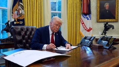 US President Donald Trump signs executive orders in the Oval Office at the White House, Thursday, Jan. 30, 2025, in Washington. (AP) US President Donald Trump signs executive orders in the Oval Office at the White House, Thursday, Jan. 30, 2025, in Washington. (AP)
