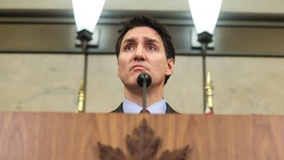 Canada's PM Justin Trudeau looks on during a press conference while responding to US President Donald Trump's orders to impose 25% tariffs on Canadian imports, in Ottawa, Ontario, Canada February 1, 2025. (Reuters)